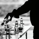 Behind the bottle