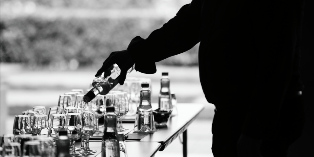 Behind the bottle